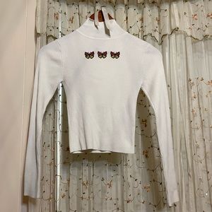 Worn once long sleeve white turtle neck with butterflies